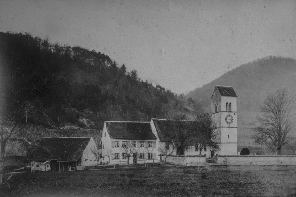 Reformierte Kirche St. Niklaus, Sigristenhaus und -scheune in Lausen